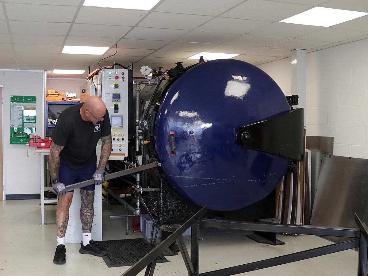The autoclave door open in the CF Composites workshop